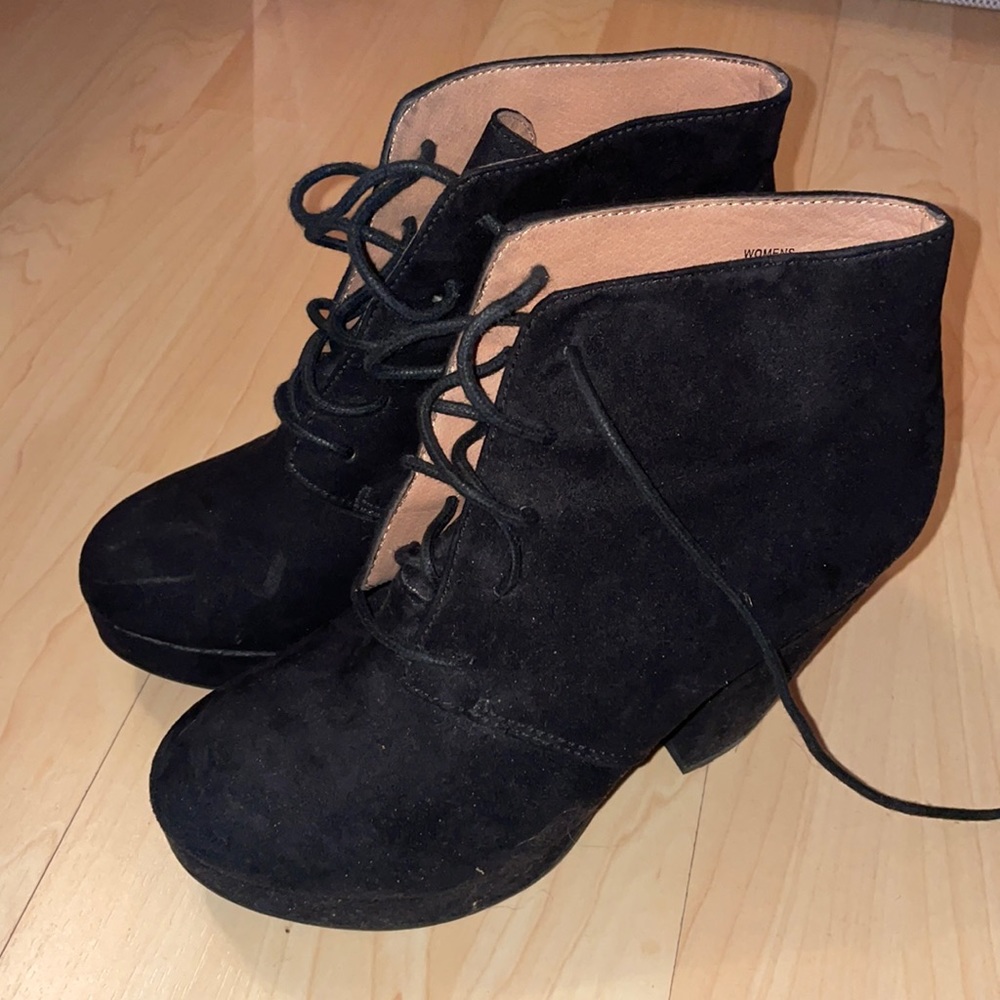 Black heel lace up boots